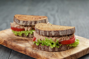 Wall Mural - Sandwich with tuna and vegetables on rye bread