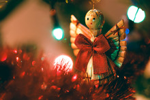 Cute Wooden Christmas Angel Hanging In Tree