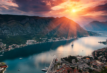 Canvas Print - Panoramic view of Kotor bay at sunset. Lovcen Mountains in Montenegro.