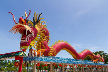 Wall Mural - The Elegant Dragon on the sky at chinese temple in Thailand.