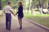 Fototapeta Las - Autumn couple love walk