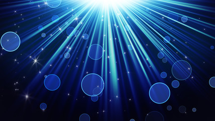 Wall Mural - blue rays of light and shining stars abstract background