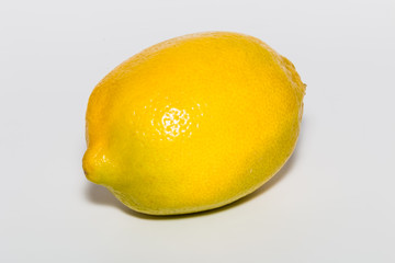 Wall Mural - yellow lemon on paper background