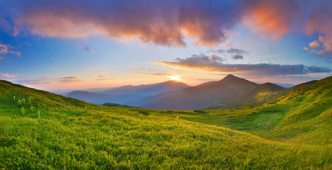 Wall Mural - Sunset in summer mountains