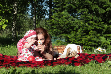 Wall Mural - mother and daughter at a picnic