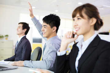  business woman with her staff in conference room