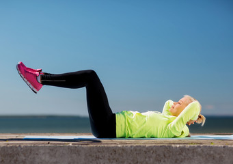 Wall Mural - woman doing sports outdoors