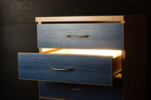 Mystery Concept Light From Open Drawer In The Darkness