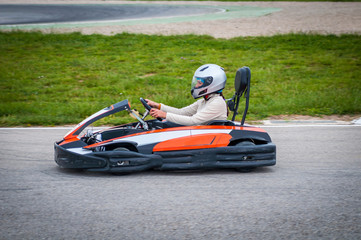 Woman driving a kart