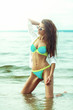 © VERSUSstudio - Beautiful Young Bikini Woman On Sunny Day Beach