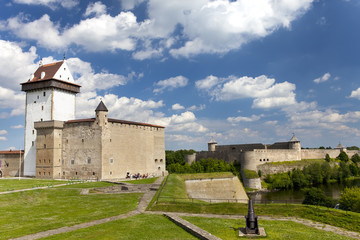 Two ancient fortresses on the parties from the river which is border. Narva, Estonia and Ivangorod behind the river, Russia.