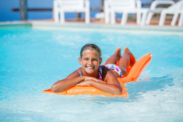 Canvas Print - Girl at swimming pool