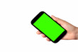 Hand holding Smartphone with green screen isolated on white 