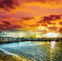 Wall Mural - Alghero harbor under a dramatic sky