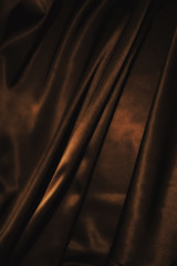 texture of cloth Chocolate brown satin  silk close up