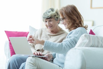 Sticker - Kind carer teaching old lady