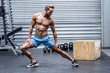 © WavebreakMediaMicro - Muscular man doing leg stretchings