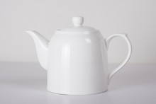 White Ceramic Teapot On White Background