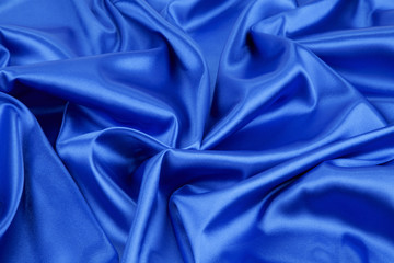 Wall Mural - Close up of blue silk cloth.
