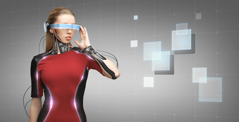 Wall Mural - woman with futuristic glasses and sensors