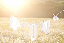 Baby Laundry Hanging On A Clothesline