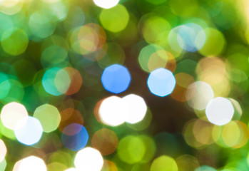 Wall Mural - green blurred shimmering Christmas lights