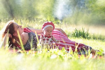 Wall Mural - mother and daughter at a picnic