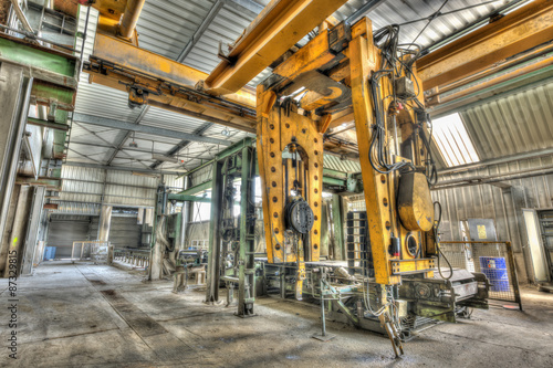 Obraz w ramie Production line in an abandoned concrete pipes plant