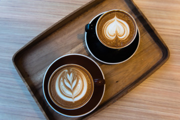 Wall Mural - Latte Art on Wooden Tray