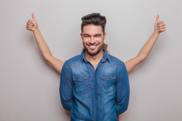 Poster - smiling young man standing with his hand behind