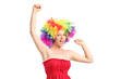 © Ljupco Smokovski - Happy young woman with a wig gesturing joy