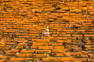 Wall Mural - Ancient red brick wall with amulet