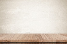 Empty Wooden Table Over Grunge Cement Wall Background
