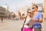 Fototapeta  - Tourists sightseeing in Venice