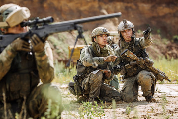 Wall Mural - rangers on the Outdoor of looking at the map