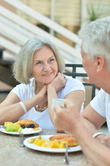 Wall Mural - Senior couple having breakfast