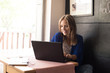 © Trendsetter Images - Woman using laptop