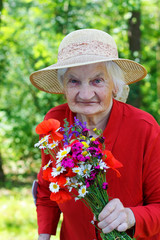 Canvas Print - Elderly with a bouquet