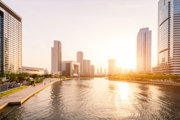 Wall Mural - modern buildings in urban city at riverbank