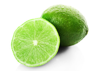 Poster - Sliced fresh limes isolated on white