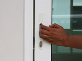 Fototapeta Mapy - Close or Open glass door by hand