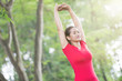 © Odua Images - Asian woman doing stretching exercise during outdoor cross train