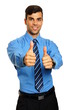 © petrdlouhy - Young businessman in blue shirt shows you thumbs up