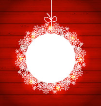 Christmas Round Frame Made In Snowflakes On Red Wooden Backgroun