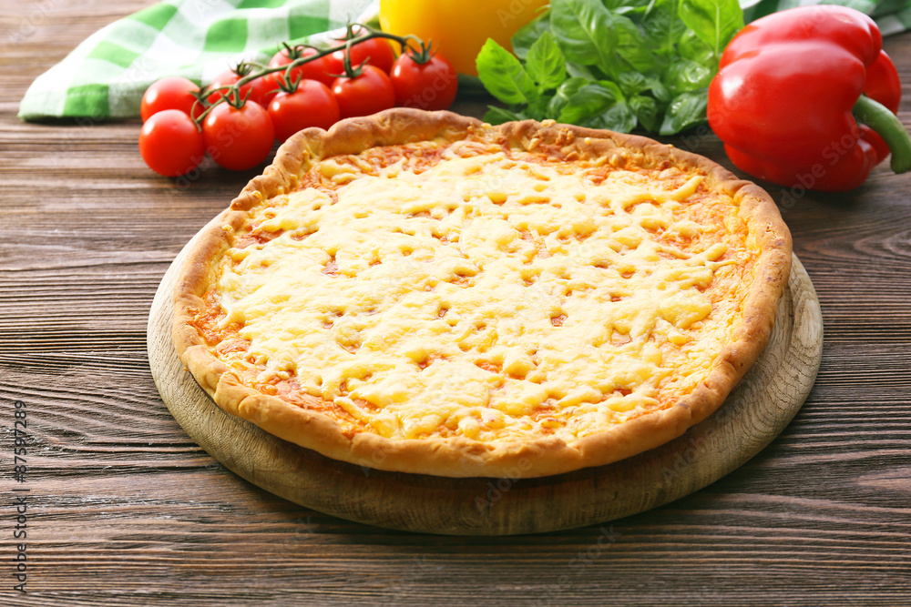 Cheese pizza with vegetables on table close up
