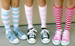 © justasc - Silly socks. Three females wearing colorful socks and tennis shoes.