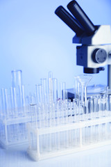 Wall Mural - test tubes and microscope in laboratory