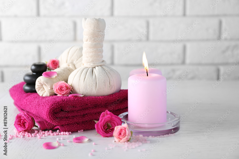Beautiful composition of spa treatment on white wooden table