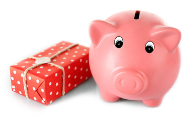 Poster - Piggy bank with present box isolated on white