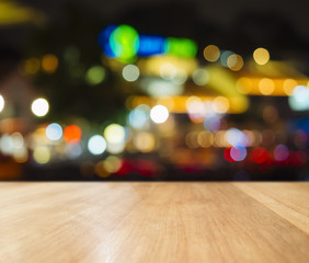 Wall Mural - Top Bar counter Bar table with Blur colourful lighting Background